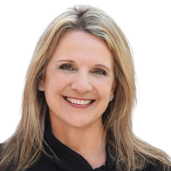 Kim Wells headshot, white background