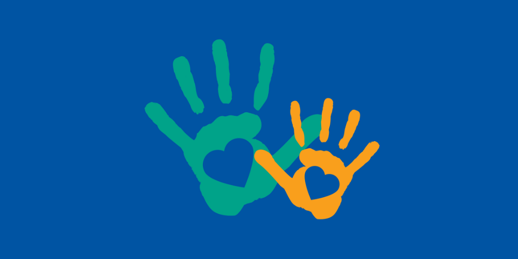 adult hand and child hand prints overlapping with hearts