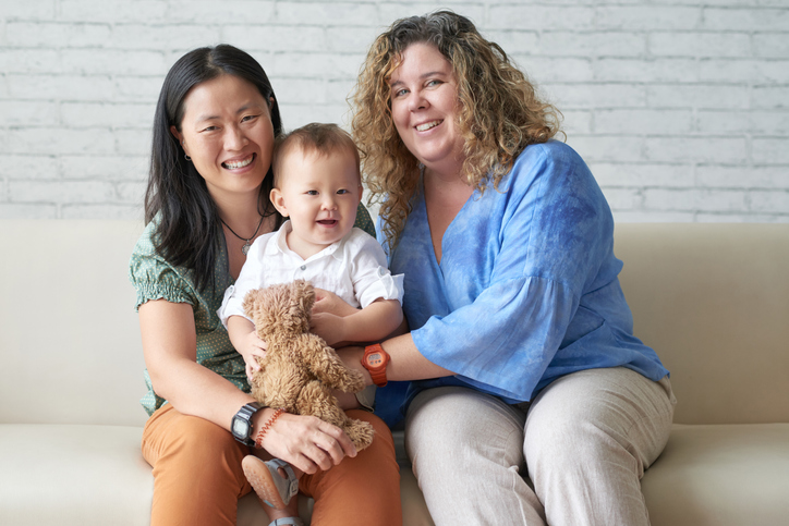 lgbt+ couple with baby adoption