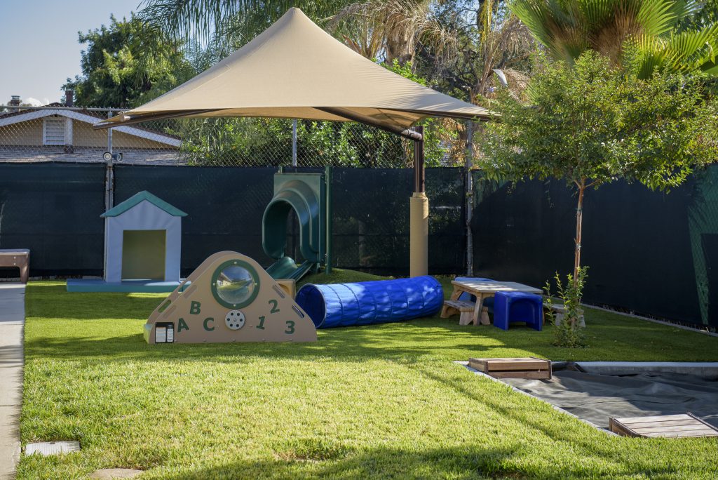 a play structure in a yard