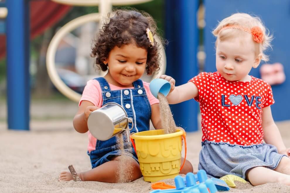 Kids playing at sand