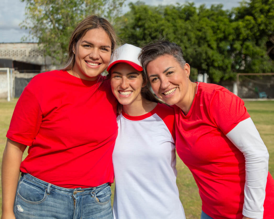 Three ladies smiling