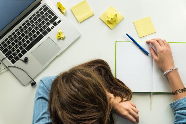 female employee experiencing burnout at work